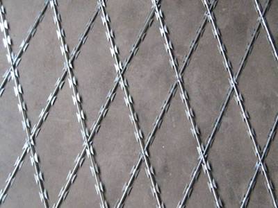 A piece of welded razor wire with diamond meshes.
