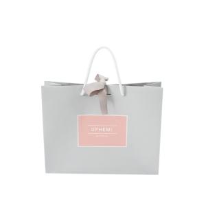 China Eco Recycled Gift Bags 200gsm White Kraft Paper Wedding Drawstring Bags wholesale