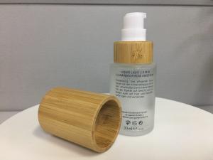 China SGS MSDS Bamboo Cosmetic Packaging Cylinder Glass Lotion Pump Bottle wholesale