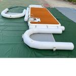 Floating inflatable water play equipment teak deck yacht docking boat dock water