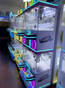 China New Net Red Coin Commercial Doll Grabbing Machine Fully Transparent 220V wholesale