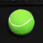 2.5'' dog chewing tennis ball with squeaker inside