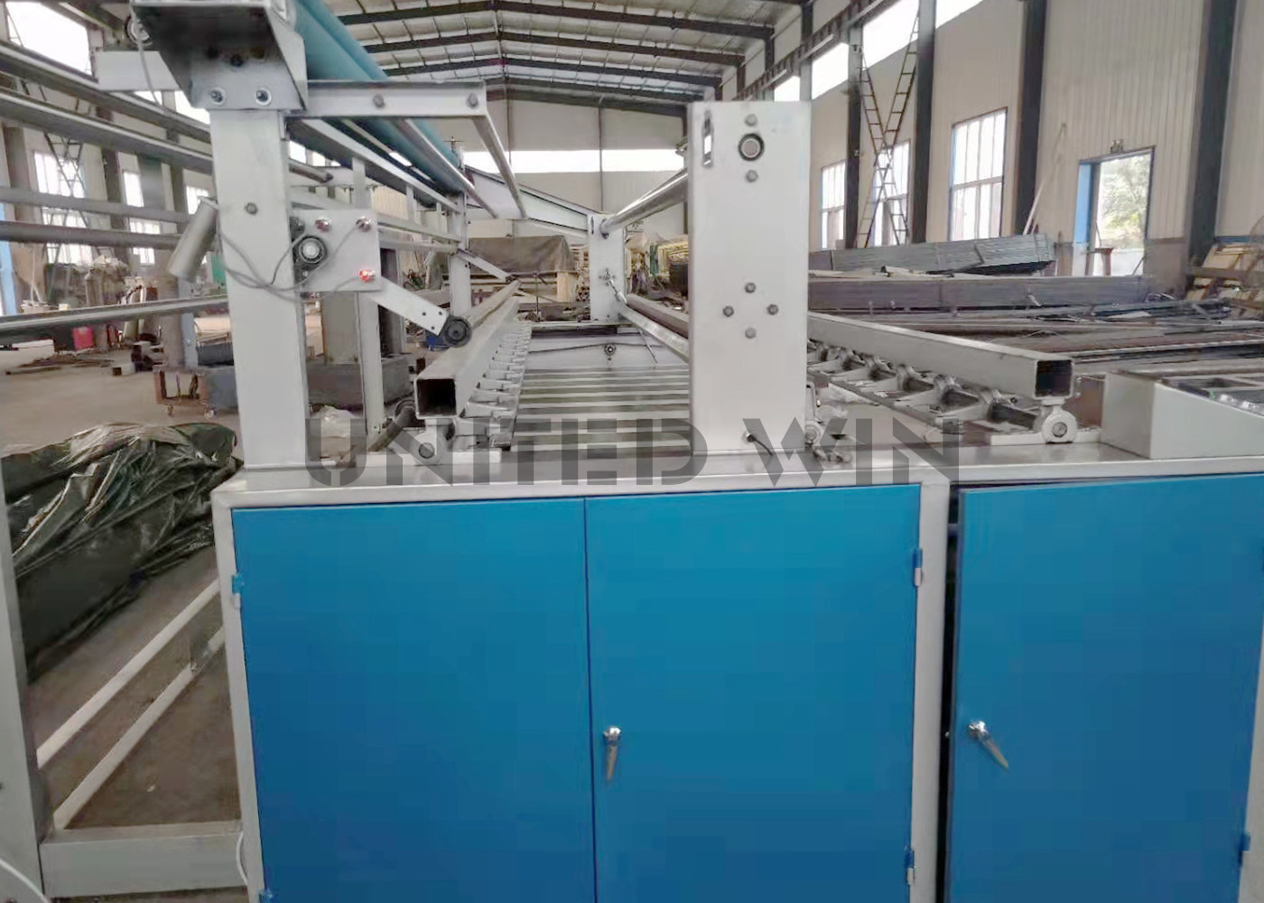 Fully Automatic Tarpaulin Fabric Folding Making Machine Tarpaulin Finishing Machinery