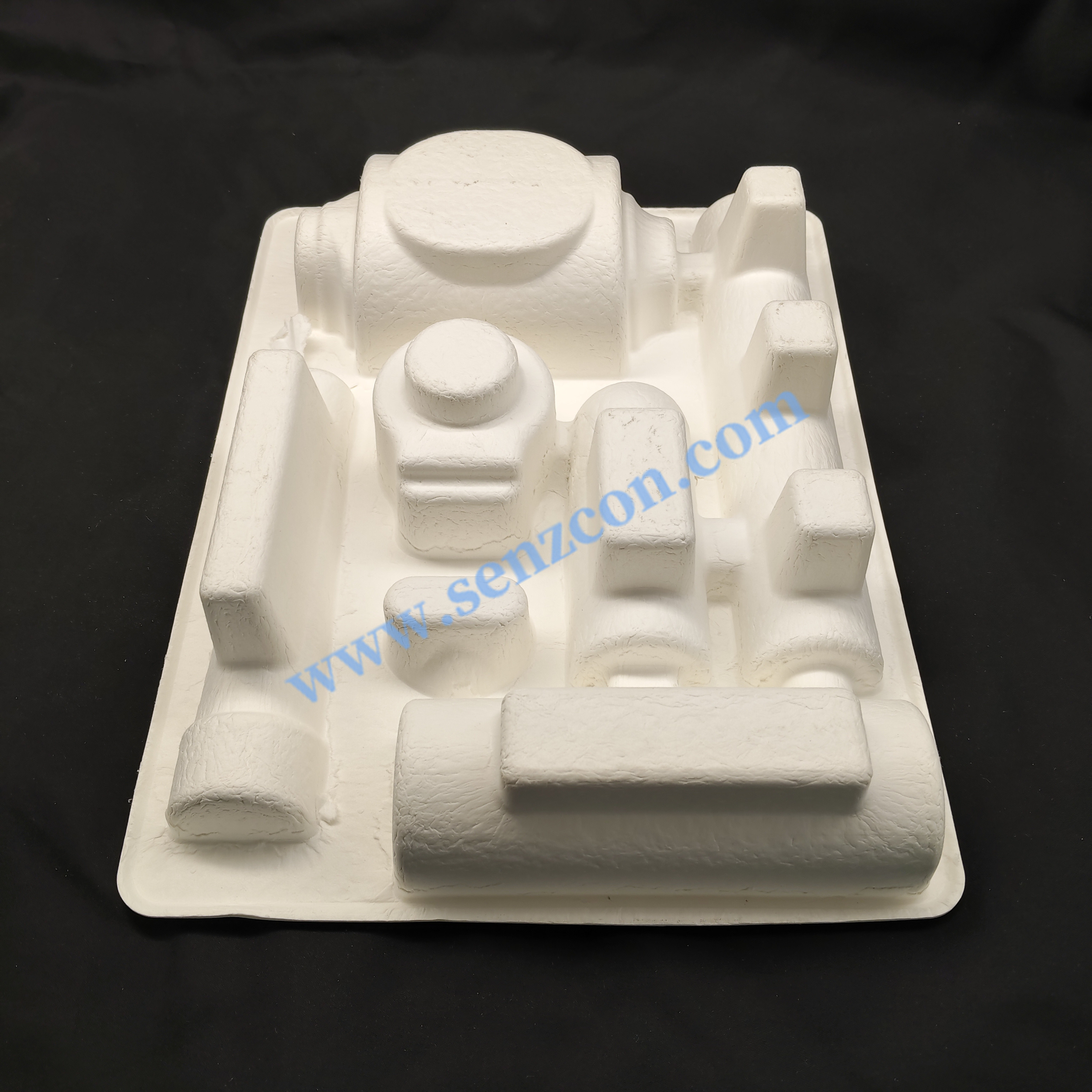 OEM eco-friendly white pulp molded packaging base for hardware accessories made from bagasse.It is a high-quality product produced by wet pressing,