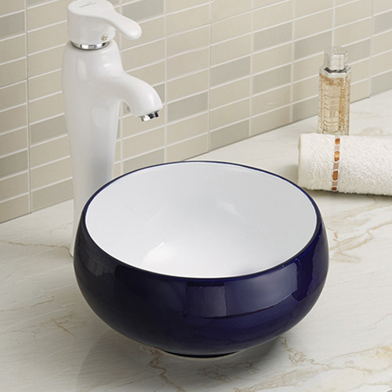 Sleek And Elegant Counter Top Bathroom Sink White Oval Shape Wash Basin