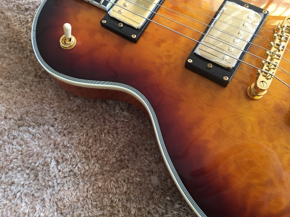 LP custom guitar tobacco sunburst quilted maple body Back contour and neck joint contour Ebony fingerboard custom guitar