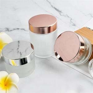China Makeup Clear Glass Cosmetic Jars Bottles Custom Painting Matte Pink Lid wholesale