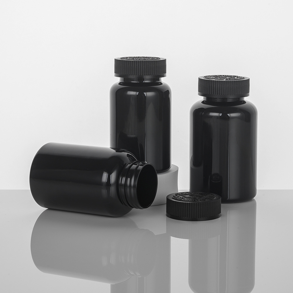 Highly Customized 4oz PET Capsule Bottle of Orange Black Plastic Nutrition Supplement with Purple Tamper Proof Packaging