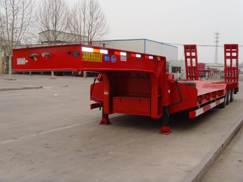 3 Axle Low Bed Semi Trailer Red Color with Self-Steering Axles and Hydraulic Ramps