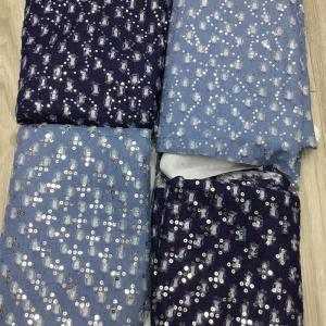 China Hollow Stretch Embroidered Sequin Jean Denim Fabric Polyester Cotton wholesale
