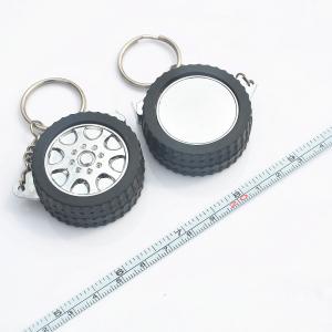 China Tire Shaped Casing Mini Steel Tape Measure Keychain Multifunctional wholesale