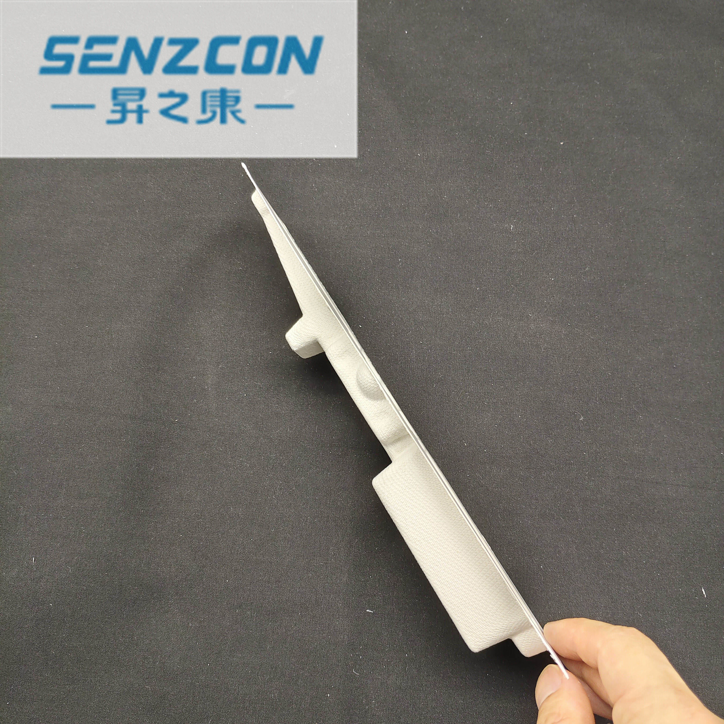 The pulp molding factory directly supplies the packaging for electronic watches. It has an embedded base that prevents falling and provides shock