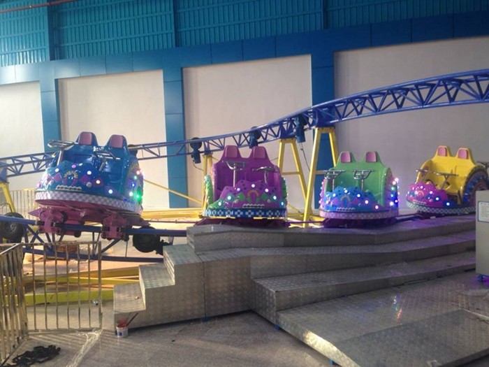 Thrilling Theme Park Kiddie Roller Coaster With Remote Control Unit And LED Lamps