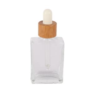 China 30ml 50ml 100ml Square Clear Glass Dropper Bottle Eco Friendly Bamboo Essential Oil Bottle wholesale