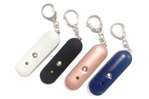 China ABS 130DB Women's Siren Alarm Keychain Safety Alert Keychain CR2032 Battery wholesale