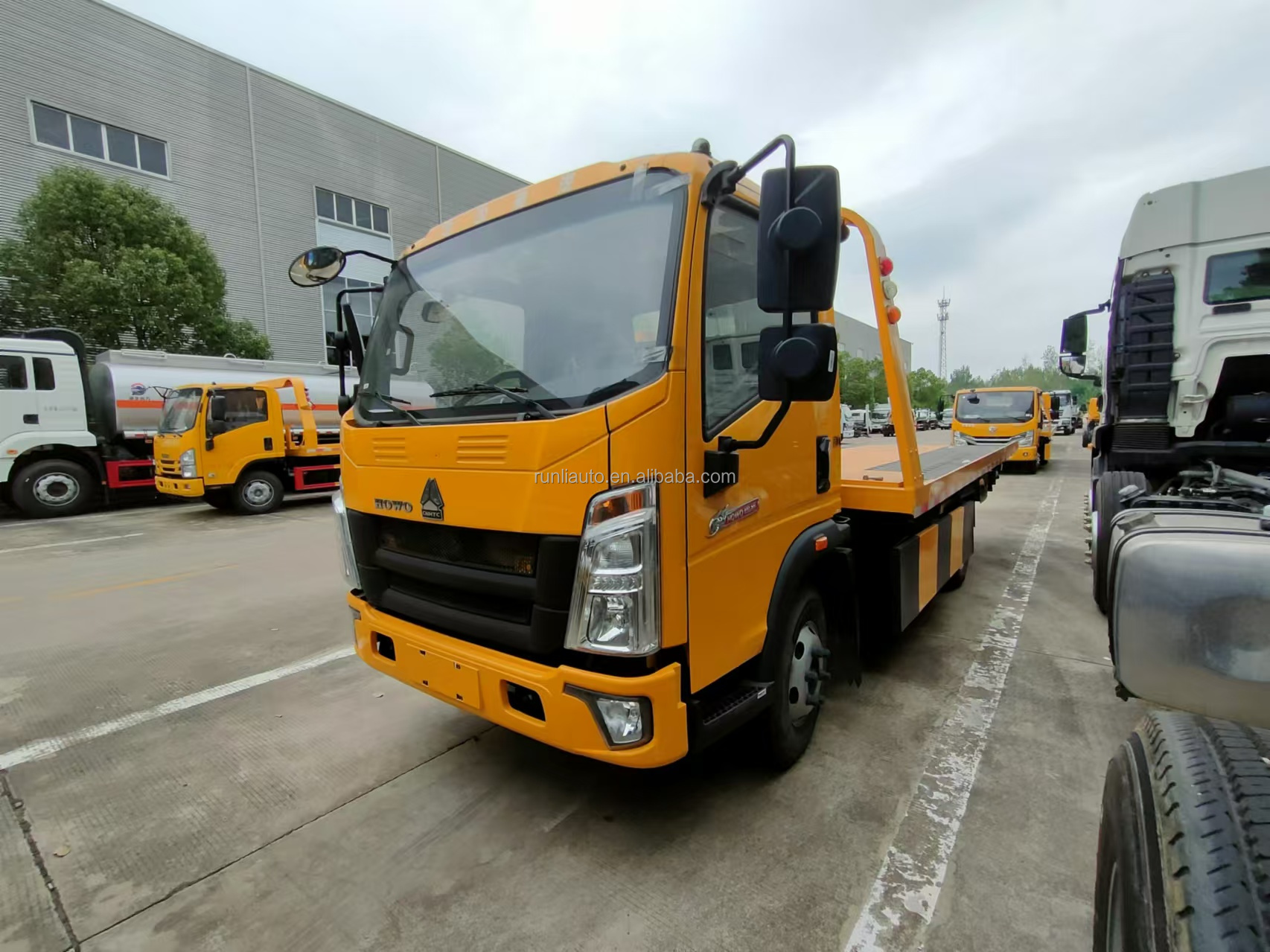 China Factory Howo Road Rescue Recovery Truck Flat Bed Tow Wrecker Truck