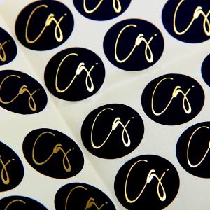 China Black Round Matte Black Paper Sticker Labels With Gold Logo wholesale