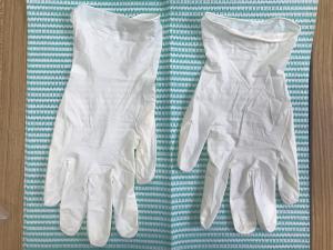 China Disposable Powder Free Vinyl Gloves Stretch Creamy Color Vinyl Gloves wholesale