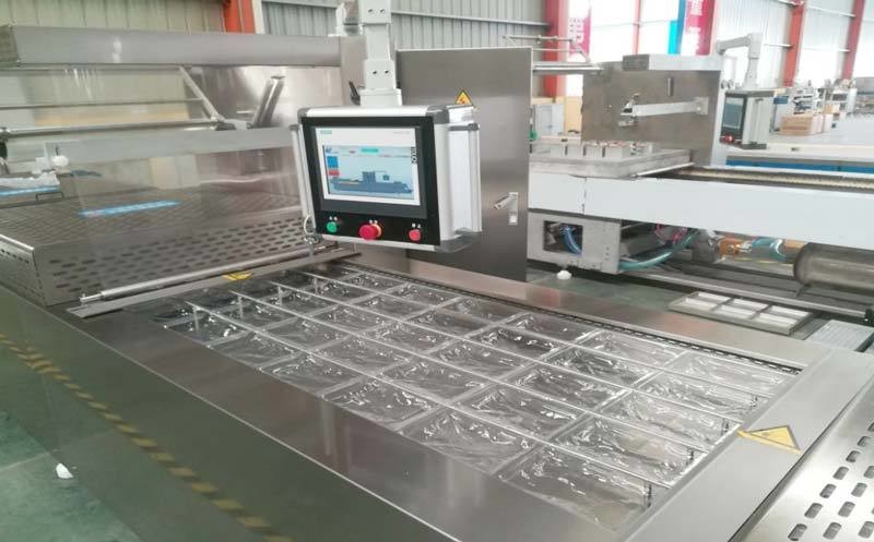 SN-420D 4 Side Sealing Packaging Machine 14.5KW Stretch Film Packing Machine
