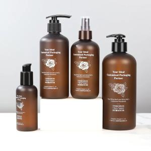 China Custom Luxury 300ml Shampoo Bottle Amber Frosted With Plastic Pump wholesale