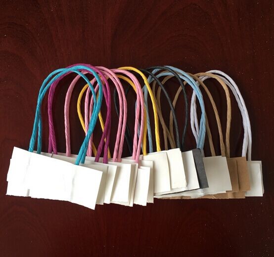 Paper bag handle for kraft paper bag twisted handles in white color