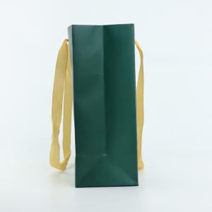 China 210gsm Coated Printed Luxury Paper Bags Glossy Lamination For Shopping wholesale