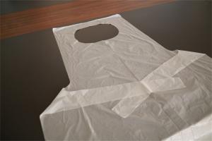China Embossed Waterproof Disposable Adult Aprons Food Processing Single Folded wholesale