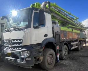 China Zoomlion concrete pump truck with 59-meter long boom is equipped with Mercedes-Benz chassis on sale