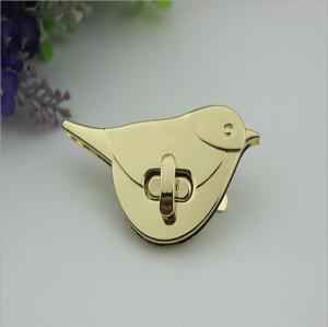 China Ladies handbags metal bird pattern high quality light gold turn twist locks wholesale
