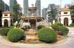Sandstone fountain in garden