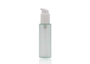 China 100ml Glass Cosmetic Pump Bottle Flat Shoulder Clear Green Color wholesale