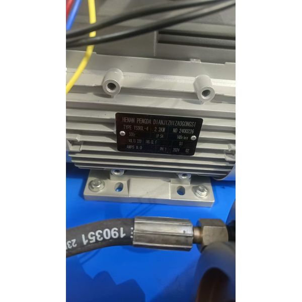 Close-up of hose crimping machine dies