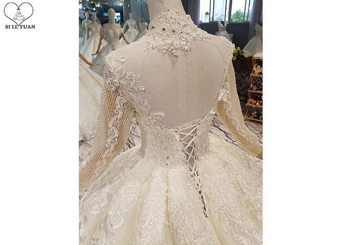 Ivory Long Sleeve High Neck Bridal Gowns Backless Sweep Train Special Beaded Net