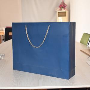 China UV Coating Luxury Paper Carrier Bags CMYK Wedding Paper Gift Bags wholesale