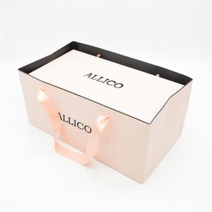 China Luxury 100-450gsm Recycled Paper Gift Bags Ribbon Handle wholesale