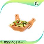 big bamboo salad and fruit bowl with hand servers