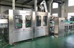 PET Plastic Rotary Bottle Filling Machine SUS304 0.25MPa Washing