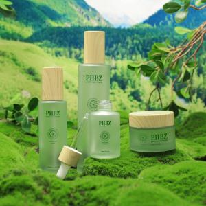 China Cylinder 120ml Cosmetics Packaging Bottle With Bamboo Lid wholesale