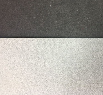 Raised Silicone Logo screen printed patches On A White Microfibre Background For Garments