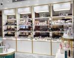 Golden Luxury Cosmetic Display Cabinet 4 Layers With Acctrative Advertising