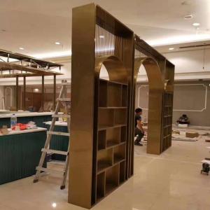 China Clothing Shop Gold Stainless Steel Floor Stand High End Store Clothes Display Shelves wholesale