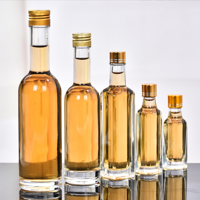 Glass Olive Oil Bottle 100ml 250ml 500ml Round Clear Cooking Oil Bottle with Cap