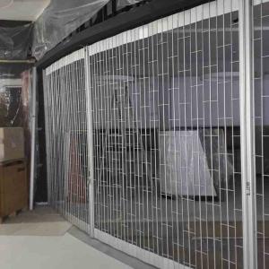 China Aluminum Flexibility Sliding Folding Shutter Doors For Storefronts / Retail Stores wholesale