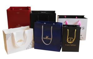 China Custom logo printed luxury paper shopping bag, logo printed paper bag wholesale