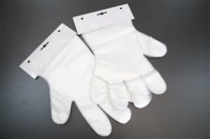 China Embossed Disposable PE Gloves For Food Service , Clear Plastic Disposable Gloves wholesale